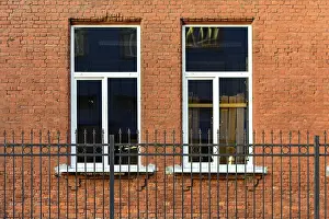 Two rectangular windows with white frame