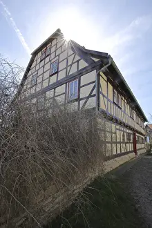 Timber Framed Houses Germany Drucke: Rectory of St. Stephen in backlight