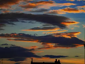 Cloudy Evening Scene Drucke: Red-blue sky with clouds at sunset