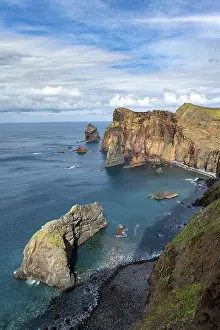 Steep Cliff Face Europe Drucke: Red cliffs and rocks in the sea