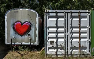 Saxony Anhalt Landmarks Drucke: Red heart on a construction container
