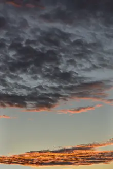 Red Clouds Germany Drucke: Red shining clouds in the evening sky