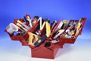 German Studio Shot Drucke: A red toolbox with tools, hammer