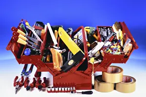 German Studio Shot Drucke: A red toolbox with tools, hammer