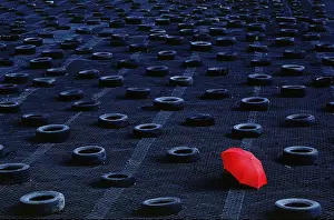 Abstract Still Life Photography Drucke: Red umbrella on garbage dump