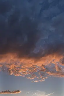 Evening Atmosphere In Germany Drucke: Reddish clouds in the evening sky