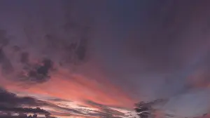 Reddish Clouds Germany Drucke: Reddish clouds in the evening sky