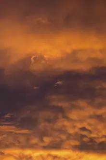 Evening Sky Germany Drucke: Reddish clouds in the evening sky