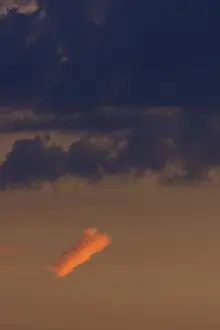 Cloudy Skies In Bavaria Drucke: Reddish small cloud in evening light