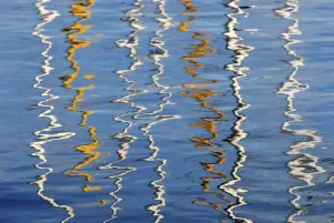 Northern Germany Harbor Scene Drucke: Reflection of the masts of sailing ships on the water