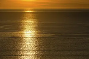 Faroe Islands Sunset Drucke: Reflection of the sunset on the sea