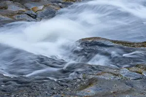 Norrbotten County Landscapes Drucke: Reflections on a rock at a rushing stream