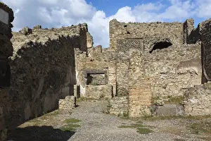 Pompeii Ruins Drucke: Remnants of old terracotta brick and stone wall structures with rectangular