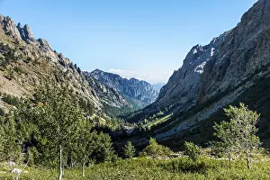Mountain Range Scenery Photos Drucke: Restonica river flowing at its source through mountain valley