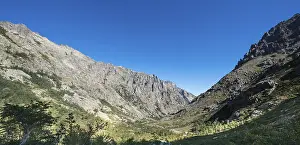 Mountainous France Drucke: Restonica river flows at its source through mountain valley