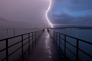 Thunderstorm Lake Constance Drucke: Retreating thunderstorm, left, and magic hour with lightning