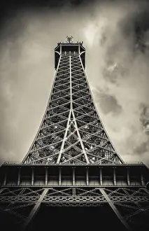 Deserted Eiffel Tower Drucke: Retro Filter Eiffel Tower From Below With Moody Sky