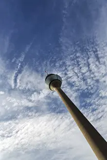 Dusseldorf Germany Drucke: Rhine Tower, diagonal, cloudy sky