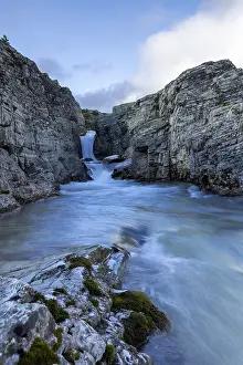 Eroded River Landscape Drucke: A river flows through a narrow gorge