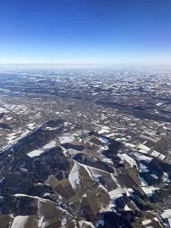 German Countryside In Winter Drucke: River loop, fields and villages with snow in winter