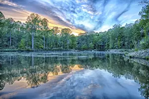 River Reflection Photography Drucke: River reflection of clouds over wide angle