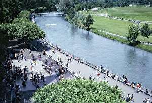 Deserted Riverbank In Europe Drucke: Riverside gardens and paths along the river Ousse, Lourdes, France 1973