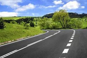Deserted Roadway Drucke: Road and cloudy sky