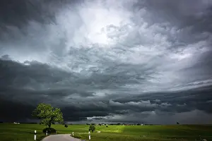 Travel Photography Bavaria Germany Drucke: Road and meadows with thunderstorm sky in the background