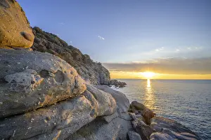 Evening Atmosphere In Italy Drucke: Rock formations in the evening light