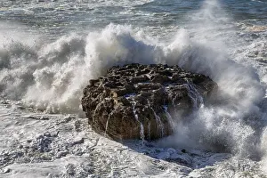 Deserted Coastline Photo Drucke: Rock in the surf, spray splashes