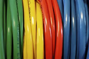 Coloured Network Cables Drucke: Rolled coloured network cables for computer