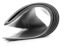Still Life Studio Photography Drucke: Rolled newspaper