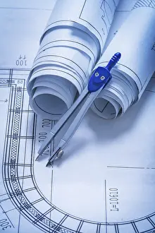 Blueprint Rolls Drucke: Rolls of blueprints and drawing compass construction concept