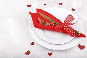 Romantic Dinner Setup Drucke: Romantic table setting on white stone table