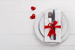 Romantic Dinner Setup Drucke: Romantic table setting on white wooden table