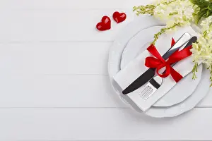 Red And White Color Scheme Drucke: Romantic table setting on white wooden table