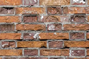 Old Brick Wall Background Drucke: Rough textured old brick wall as a background