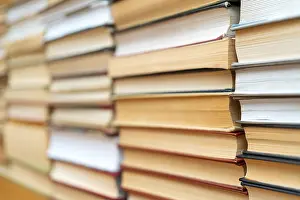 Learning Environment Drucke: Rows of books in the library. Background for text