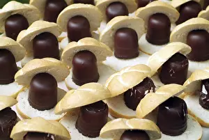Calorie Rich Desserts Drucke: Rows of chocolate marshmallows with rolls