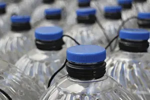 Plastic Bottles Drucke: Rows translucent plastic bottles close to
