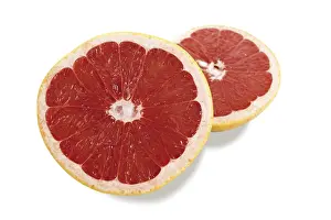 Studio Shot Citrus Fruits Drucke: Ruby Red Grapefruit (Citrus), slices