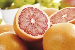 Freshly Sliced Fruits Drucke: Ruby Red Grapefruits (Citrus x paradisi)