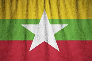 Myanmar Flag Drucke: Ruffled Flag of Myanmar Blowing in Wind