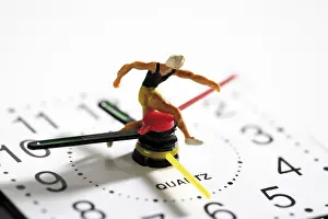 Clock Face Close Up Drucke: Runner on a clock: time is running out