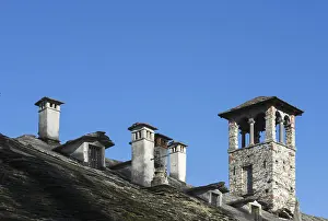 Uninhabited Swiss Countryside Drucke: Rustic Chimney Against Blue Sky in Ticino