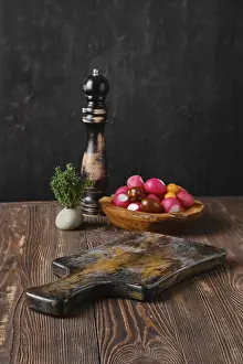 Fresh Vegetables Photography Drucke: Rustic kitchen table with fresh vegetables and pepper mill blurred on background
