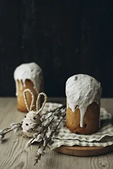 Traditional Easter Dessert Drucke: A rustic setup featuring two Kulich