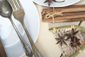 Deserted Breakfast Table Drucke: Rustic table set and spices knife spoon fork view from top