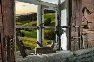 Black Forest Landscape Photography Drucke: Rustic workshop with old tools and view out of the window into the landscape