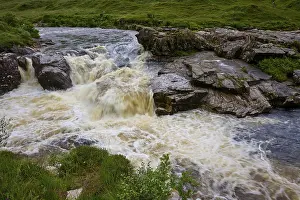 European Highland Landscapes Drucke: Rustling river flows over rocks in a green landscape